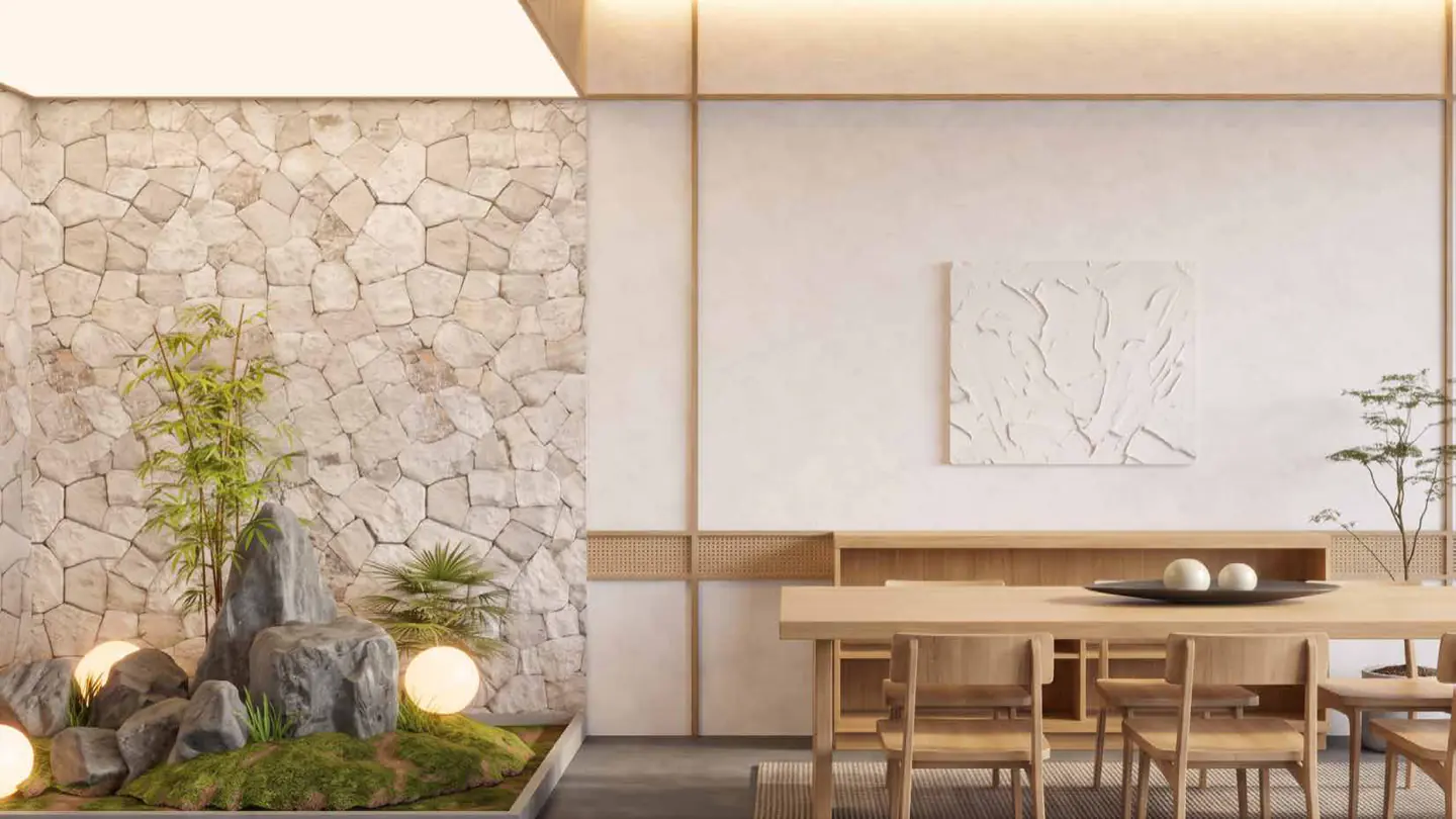 A Japanese-influenced stone garden with lantern globes and moss.